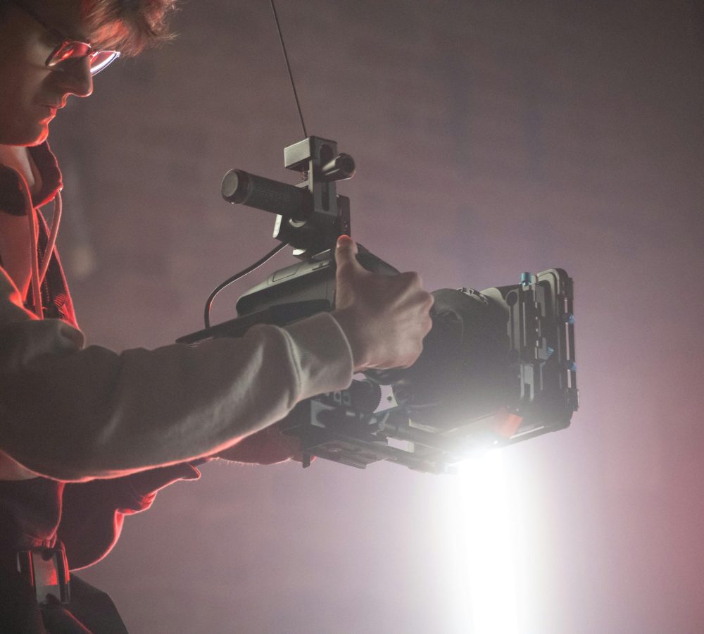 Freeman productions camera man filming corporate video