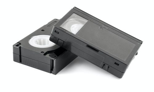VHS-C video cassettes to digital on white background